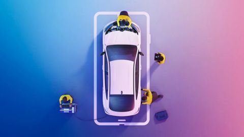 Aerial View 4 People Working On Vehicle With Blue Pink Background